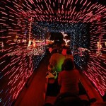 McCormick-Stillman train going through lit tunnel.